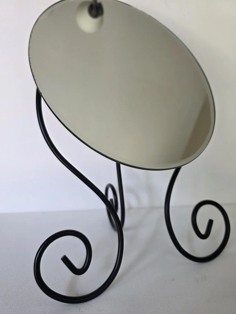 Vintage 1999 Myken Round Vanity Mirror with Black Scroll Frame